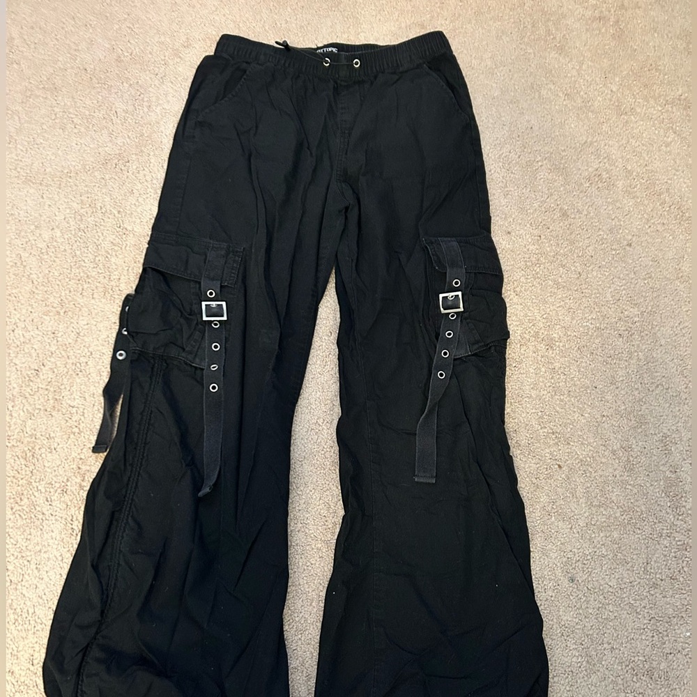 Black corgo pants with buckles on front